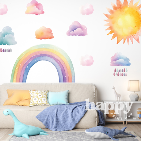 Rainbow, cloud and sun wall decals on a nursery wall above a sofa with soft toys