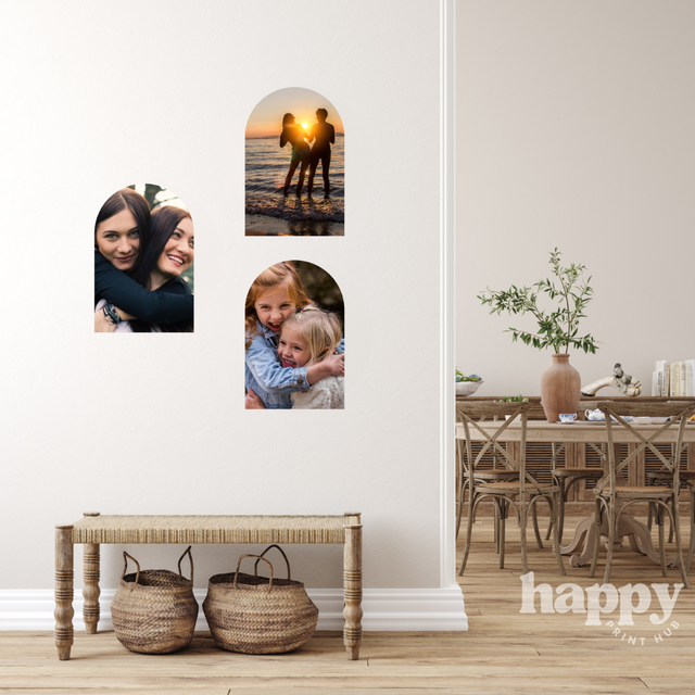 Personal photos printed as 30cm arch removable photo wall decals, arranged on a hallway wall